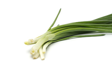 Image showing Eight ripe, beautiful spring onions on a white background.