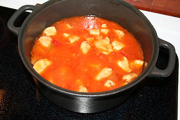 Image showing Chicken-dish in iron-casserole