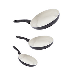 Image showing Three pans isolated on white
