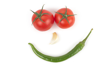 Image showing Chili pepper, garlic and tomatos isolated on white background