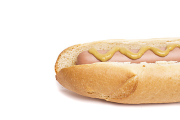 Image showing An old-fashioned hot dog with mustard