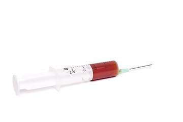 Image showing syringe with red medication isolated on white background