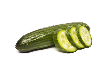 Image showing Cucumber and slices isolated over white background.