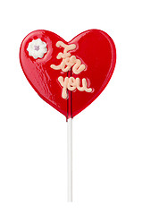 Image showing red heart-lollipop isolated on white