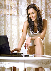 Image showing girl with notebook computer