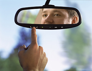 Image showing rear-view mirror in a car