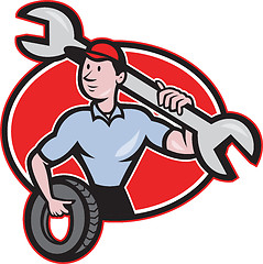 Image showing Mechanic With Spanner And Tire Wheel