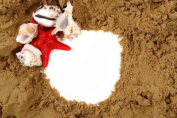 Image showing sea shells, paper and yellow sand 