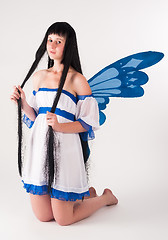 Image showing Attractive girl as fairy with wings