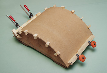 Image showing Gluing the workpiece of hardboard