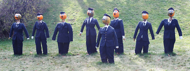 Image showing Pumpkin people - businessmen in suits