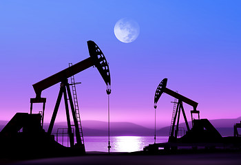 Image showing oil pumps at night