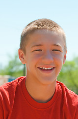 Image showing Happy and smiling teen boy