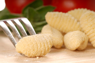 Image showing Freshly made Gnocchi using a fork