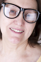 Image showing smiling senior woman with glasses