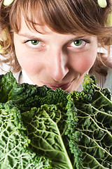 Image showing woman and fresh savoy cabbage