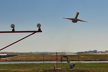 Image showing jet approaching airport