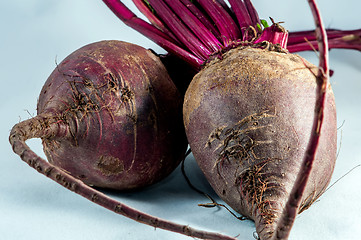 Image showing two beetroots over white background