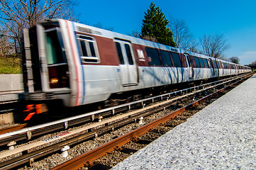 Image showing Metro unit leaves station