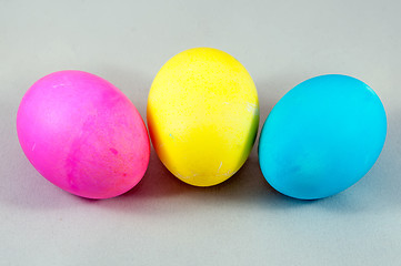 Image showing three easter eggs pink  blue yellow