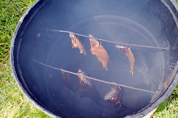 Image showing healthy ecology fish smoke smokehouse rusty barrel 