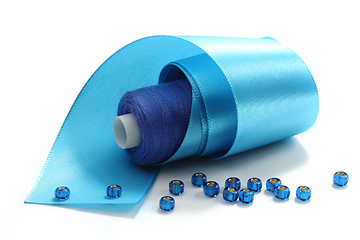 Image showing Blue tape and blue threads