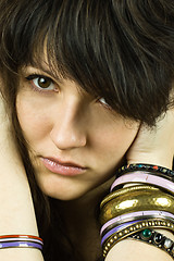 Image showing brunette lady with bracelets