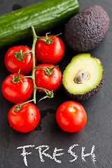 Image showing Fresh tomatoes and avocados and cucumber