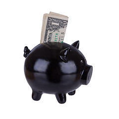 Image showing Piggy bank with one dollar bill