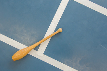 Image showing Wooden pin on a court