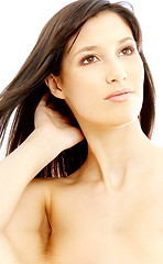 Image showing lovely brunette looking up in water