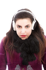 Image showing Cold woman wearing ear muffs