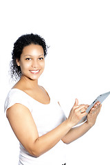Image showing Beautiful woman scrolling on her tablet
