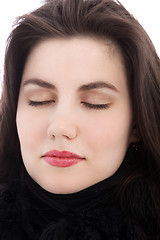 Image showing Relaxed brunette woman with eyes closed, close up