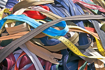 Image showing Zippers on a market