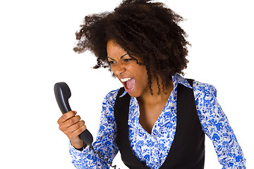 Image showing Angry african american woman with handset