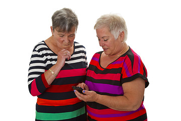Image showing Two female senior with cellphone
