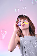 Image showing blowing soap bubbles