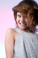 Image showing  pretty 8 year old girl in silver dress