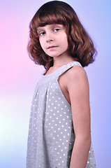 Image showing  pretty 8 year old girl in silver dress