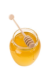 Image showing Honey in bank  isolated by the white