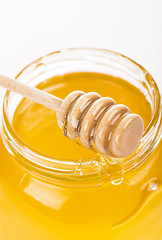 Image showing Honey in bank isolated by the white