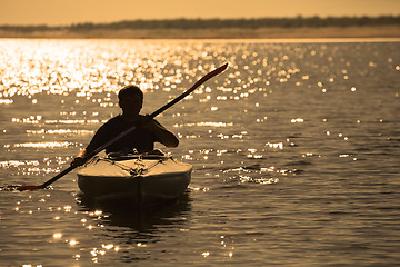 Image showing Rowing at sunset