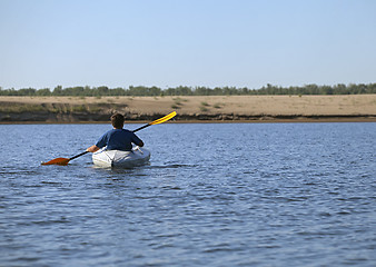 Image showing Rowing man