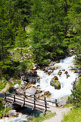 Image showing Bridge on mountain river