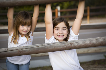 Image showing Pretty Young Sisters Portrait Outside