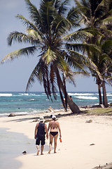 Image showing man woman tourists walking  Sally Peaches Beach Big Corn Island 