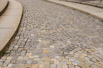 Image showing A paved street with a curb under intense uphill