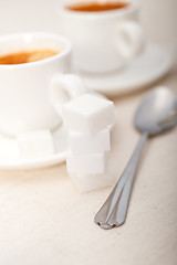 Image showing Italian espresso coffee and sugar cubes