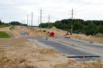 Image showing cars roundabout highway construct electricity pole 